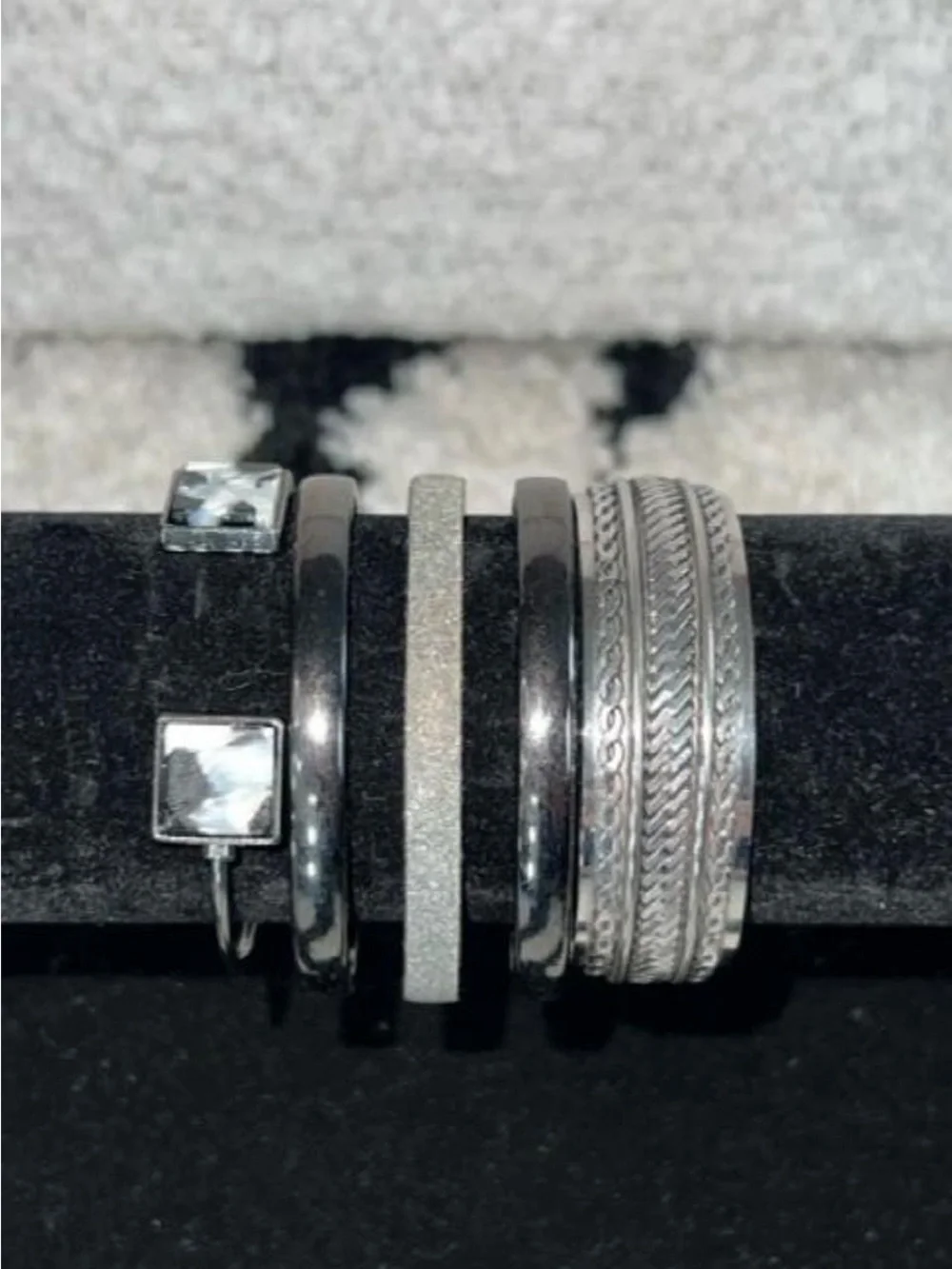 Silver and gunmetal tone set of 3 cuff bracelets